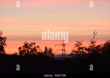 Stunning unset over Haytor Rock in the Dartmoor National Park viewed from Newton Abbot, Devon, England Stock Photo