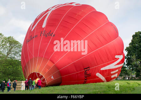 Inflating a Virgin hot air balloon. Cumbria, UK Stock Photo