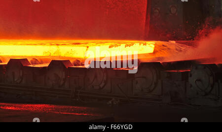 hot plate on conveyor inside of steel plant Stock Photo