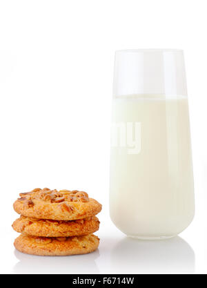 Stack of three homemade peanut butter cookies and glass of milk, isolated on white background Stock Photo