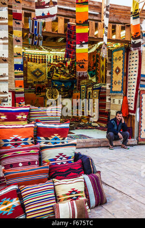 Traditional Arabian fabric weaves and tourist souvenirs in Dahab, Egypt. Stock Photo