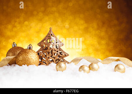 Golden christmas fir tree decoration with gold ornaments Stock Photo
