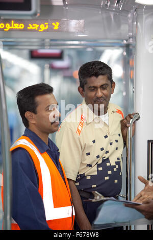 Engineering staff on Dubai Metro Stock Photo