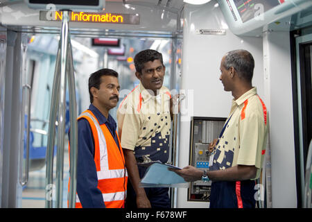 Engineering staff on Dubai Metro Stock Photo