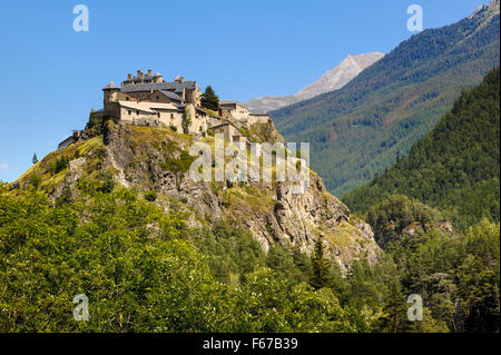 13th century castle atop a rocky hillside in the Queyras region of the Southern French Alps (Hautes-Alpes) Stock Photo