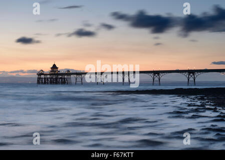 High tide and dusk over the Victorian Pier at Clevedon, Somerset. Stock Photo