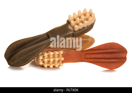 Dog toothbrush chews studio cutout Stock Photo