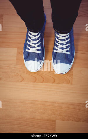 wearing sneakers on a blue wooden surface, top view Stock Photo - Alamy