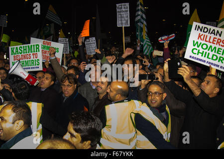Wembley, London, UK. 13th November, 2015. Amid high security measures, hundreds of Kashmiri protesters, supported by George Galloway, demonstrate outside Wembley Stadium ahead of an address to more than 60,000 Indian expats by Prime Minister Narendra Modi at a 'UK Welcomes Modi’ reception. Modi, a Hindu and his BJP party are accused of a wide range of human rights abuses against religious and ethnic minorities in India. PICTURED: Kashmiris protest outside the Stadium as Modi addresses the crowd inside. Credit:  Paul Davey/Alamy Live News Stock Photo