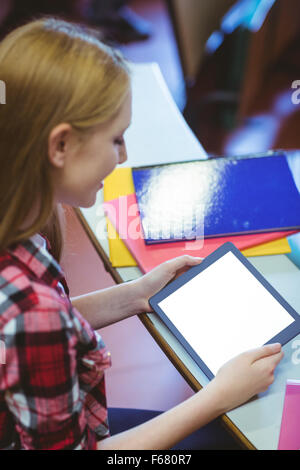 Blonde student using tablet during class Stock Photo