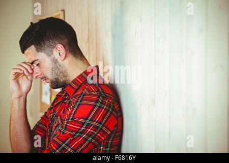 Handsome hipster feeling stressed out Stock Photo