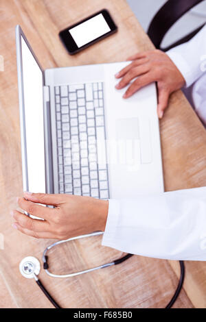 Doctor using laptop Stock Photo