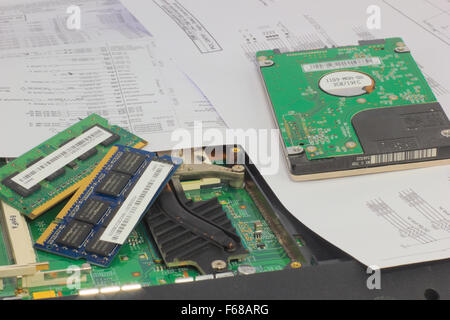 closeup of the circuits of a notebook faulty and related wiring diagrams Stock Photo