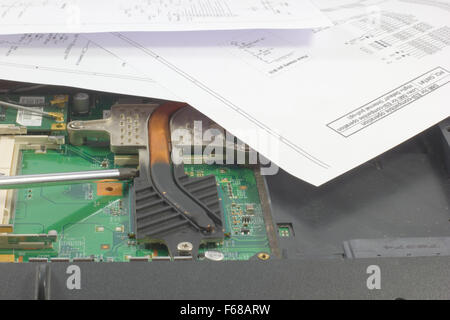closeup of the circuits of a notebook faulty and related wiring diagrams Stock Photo