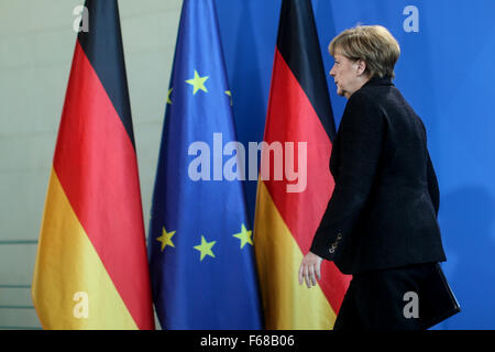 Berlin, Germany. 14th Nov, 2015. German Chancellor Angela Merkel leaves after a press conference on the attacks in Paris at the Chancellery in Berlin, Germany, on Nov. 14, 2015. Credit:  Zhang Fan/Xinhua/Alamy Live News Stock Photo