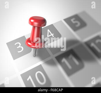 Calendar and red thumbtack. Mark on the calendar at 3. Stock Photo
