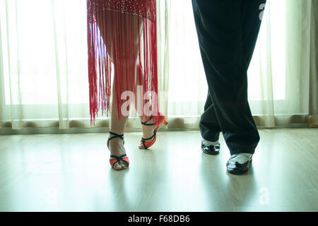Closeup of legs of two professional latin dancers Stock Photo