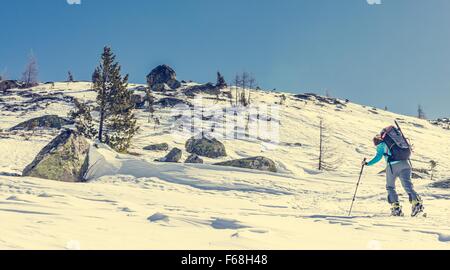 Skier walking on a trail. Stock Photo