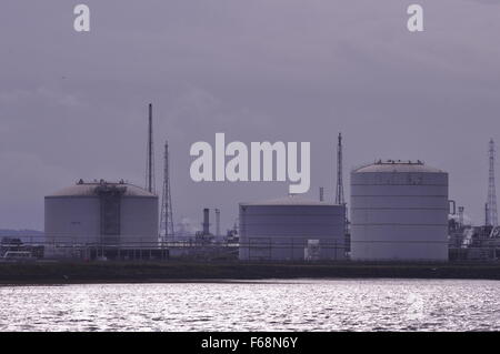 industry Teesport Tees Mouth industry fossil fuels fuel tank tanks reflection River river Cleveland UK Stock Photo