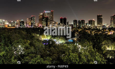 Nighttime view across Mexico City and Chapultepec Park Stock Photo