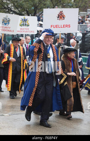 London, UK. 14 November 2015. Members of the Modern Livery Companies. The Lord Mayor's Show in the City of London celebrates its 800th anniversary with a 7,000 strong pageant including 173 horses, 140 vehicles, marching bands, steam rollers and vintage vehicles. Credit:  bas/Alamy Live News Stock Photo