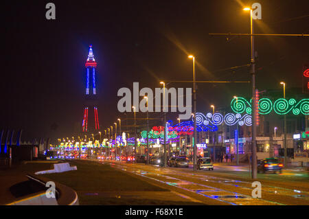 Blackpool, UK. 14th November, 2015. Blackpool's tower a minature copy of the Eiffel tower in Paris is coloured Blue White and Red the French flag in memory of the devastating attacks in Paris yesterday. Credit:  gary telford/Alamy Live News Stock Photo