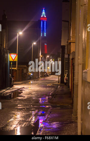 Blackpool, UK. 14th November, 2015. Blackpool's tower a minature copy of the Eiffel tower in Paris is coloured Blue White and Red the French flag in memory of the devastating attacks in Paris yesterday. Credit:  gary telford/Alamy Live News Stock Photo