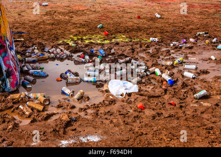 Empty cans of paint left behind by people after adding their tags to the Cadillac Ranch public art sculpture in Amarillo, Texas. Stock Photo