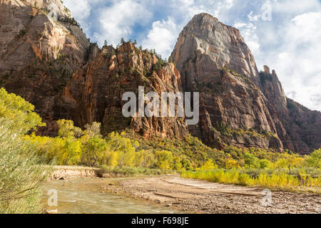 Cable Mountain and the Great White Throne tower over the Virgin River in Zion Canyon in Zion National Park, Utah. Stock Photo