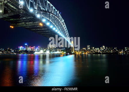 Night scenery of the Sydney city Harbor bridge viewed from Circular Quay, Sydney, Australia. Stock Photo