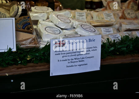 Lincoln, England, Chriskindlemarkt, a food booth selling local and other British cheeses, Lincolnshire Poacher Cheese, Stock Photo