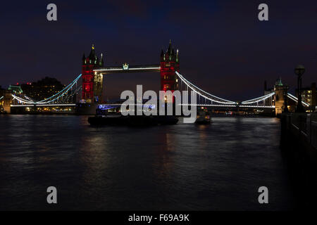 14 November 2015 Tower Bridge, London UK. Buildings around London are illuminated with the colours of the French lag The Tricolor in a show of support in light of the terrorist attacks in Paris. Stock Photo