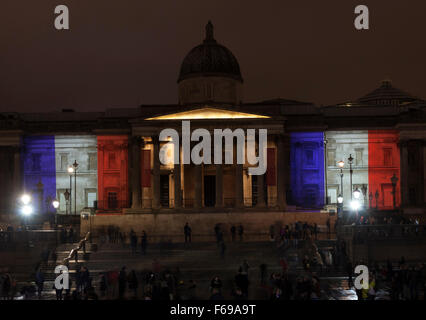 14 November 2015 The National Portrait Gallery,  London UK. Buildings around London are illuminated with the colours of the French lag The Tricolor in a show of support in light of the terrorist attacks in Paris. Stock Photo