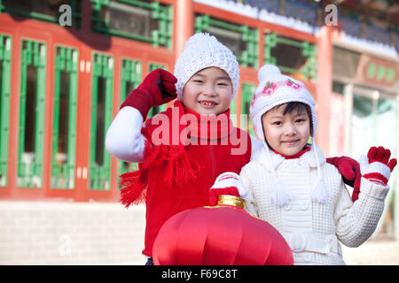 Children holding red lantern Stock Photo