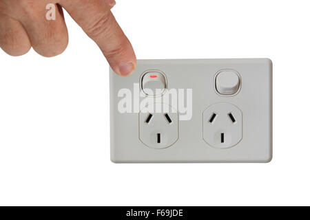 hand switching of the power switch Stock Photo