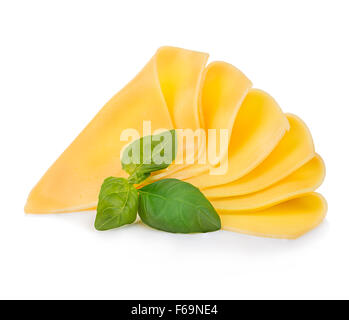 Tasty cheese slices and basil leaves on white background Stock Photo ...