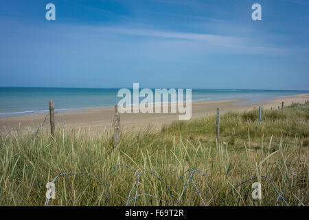 View of Utah Beach, Normandy, France, with barbed wire in the foreground Stock Photo