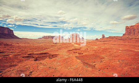 Vintage old film style photo of Monument Valley, Utah, USA.