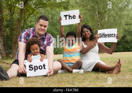 African multicultural family is holding white boards Stock Photo