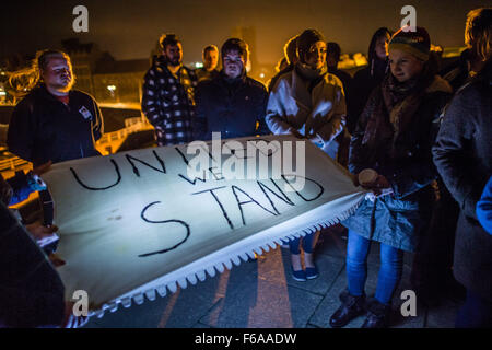 Aberystwyth, Wales, UK. 15 Nov, 2015.   A group of Aberystwyth university students hold an emotional candle-lit vigil on the steps of the town’s iconic war memorial,  in memory of all those killed in the Paris terrorist attacks of November 13 2015    photo Credit:  Keith Morris / Alamy Live News Stock Photo
