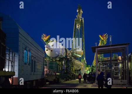 The Soyuz TMA-15M spacecraft is seen shortly after arriving at the launch pad by train on Friday, Nov. 21, 2014, at the Baikonur Cosmodrome in Kazakhstan.  Launch of the Soyuz rocket is scheduled for Nov. 24 and will carry Expedition 42 Soyuz Commander Anton Shkaplerov of the Russian Federal Space Agency (Roscosmos), Flight Engineer Terry Virts of NASA , and Flight Engineer Samantha Cristoforetti of the European Space Agency into orbit to begin their five and a half month mission on the International Space Station. Photo Credit: (NASA/Aubrey Gemignani) Stock Photo