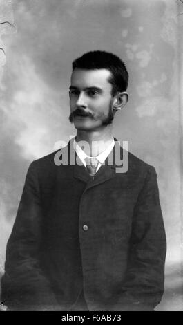 Man with short hair and mutton chops - Tallahassee Stock Photo