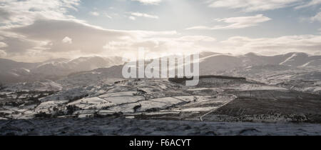 the snow capped helvellyn range looking from great mell fell Stock Photo