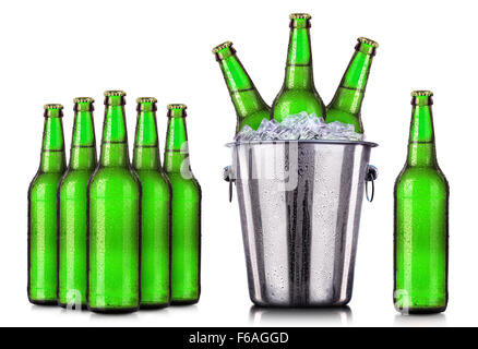 Set of beer's bottles with frosty drops in ice isolated on white background Stock Photo