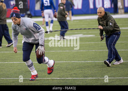 A New York Giants staff member wears an FDNY hat on the during