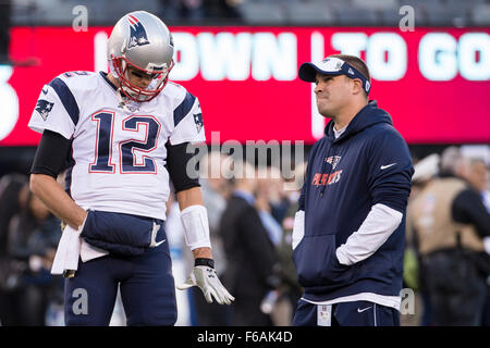 East Rutherford, New Jersey, USA. 15th Nov, 2015. New England Patriots quarterbacks coach Josh McDaniels looks on with quarterback Tom Brady (12) in action during warm-ups prior to the NFL game between the New England Patriots and the New York Giants at MetLife Stadium in East Rutherford, New Jersey. Christopher Szagola/CSM/Alamy Live News Stock Photo