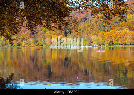 Baldeneysee lake, in Essen, Germany, fall, trees in autumn colors, winding tower of former coal mine Carl Funke, river Ruhr Stock Photo