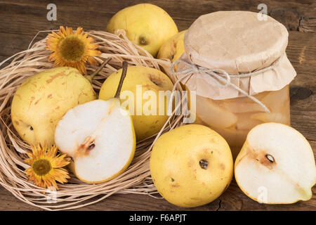 Jar with Pears Compote and Ripe Fruits Stock Photo
