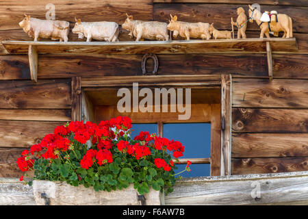 Window of typical old alpine farmhouse Stock Photo