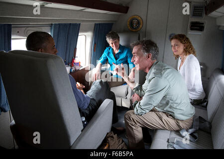 President Barack Obama talks with Bill Nye, the Science Guy, Rep. Debbie Wasserman Schultz, D-Fla., and Interior Secretary Sally Jewell aboard Marine One en route to Miami International Airport following a visit to Everglades National Park, Fla. on Earth Day, April 22, 2015. Stock Photo